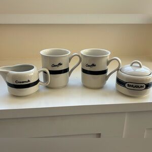 Fishes Eddy 4 piece “Cawfee” coffee mug set.